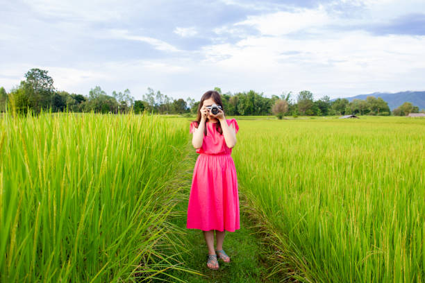 istock Asian woman's portrait in meadow 1193201088
