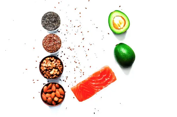 Photo of Ingredients for ketogenic diet on white background. The concept of healthy eating. Close-up