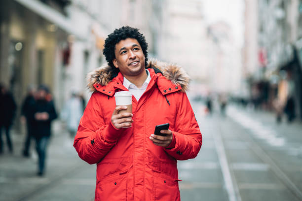 istock Modern man walking on the street 1193206355