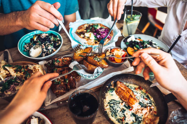 istock Enjoying lunch with friends 1193206374