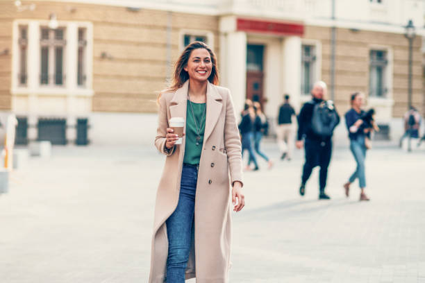 istock Happy woman outdoors 1193206414
