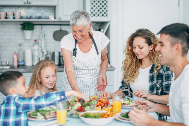 istock Cheerful family having lunch 1193206445
