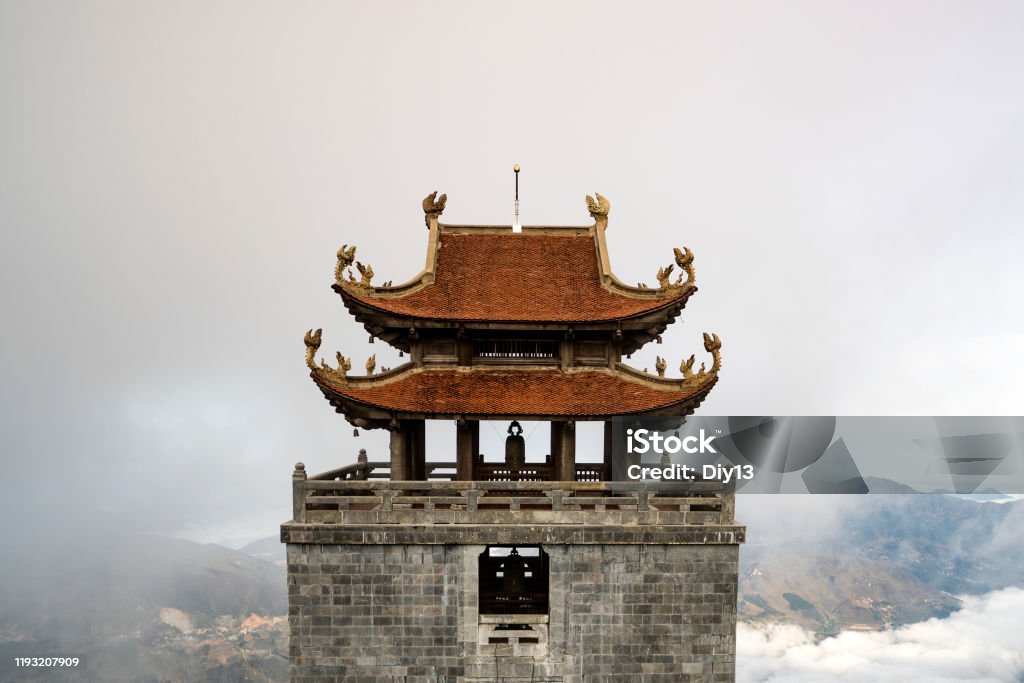 A pagoda at the top of Fansipan mountain, Vietnam A pagoda at the top of Fansipan mountain, Vietnam. Ancient Stock Photo