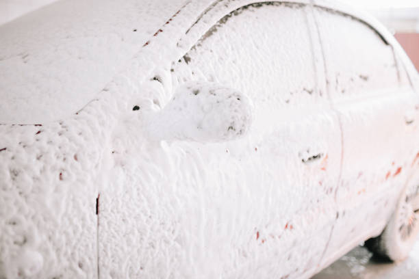 Close up detail of wash cleaning brush on car at carwash