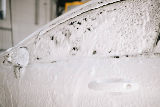 istock White car at the sink in the foam 1193215441