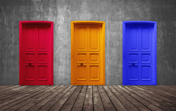 istock Three door yellow, red and blue choice on domestic rustic room 1193217704