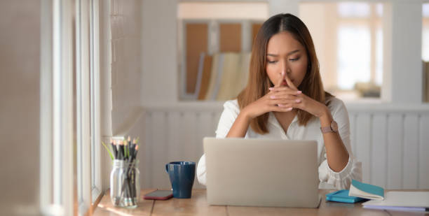 istock Young beautiful businesswoman concentrated in her work while using digital tablet 1193220893