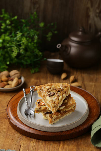 istock nutty tart cake with almonds 1193223824