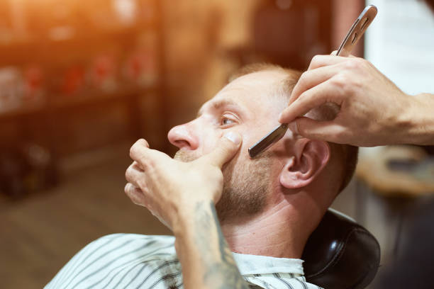 istock Man at the barber shop 1193233003