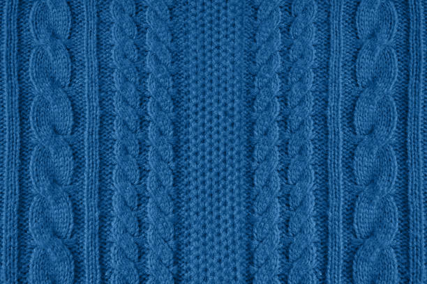 Blue knitted wool texture can use as background.Blue trend color stock photo