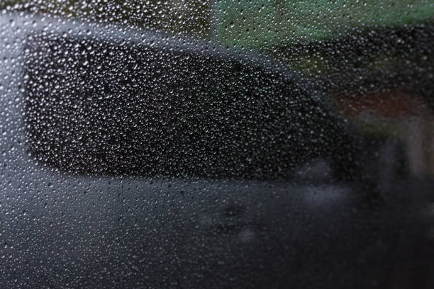 istock traffic jam in the rainy bad day, rain drop on window car 1193237319