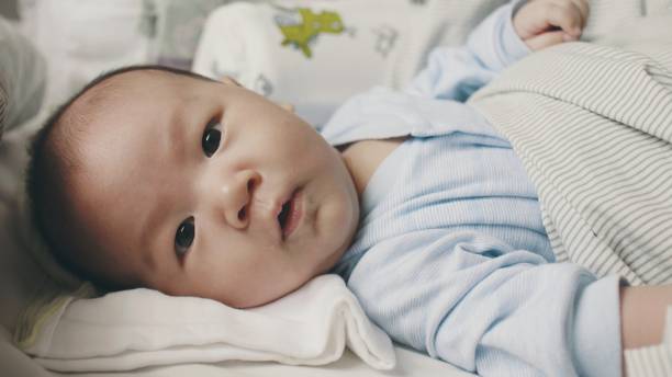 istock Serious : Facial expression of baby boy 1193239544