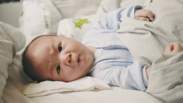 istock Serious : Facial expression of baby boy 1193239563