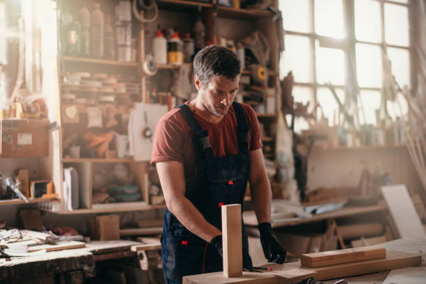 istock Carpenter at work stock photo 1193246555