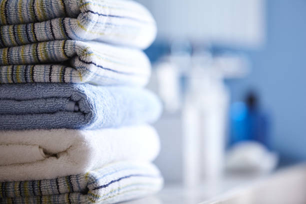 istock Pastel coloured towels in a bathroom 1193251408