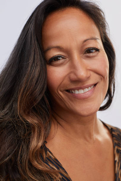 istock Mature woman with a beautiful complexion smiling 1193255172