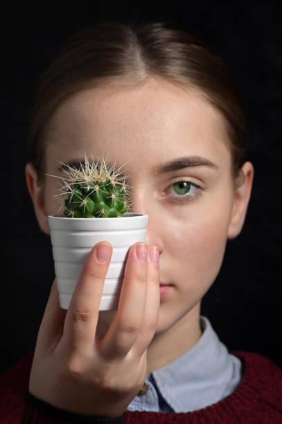 Girl With A Small Cactus Shoot in Studio