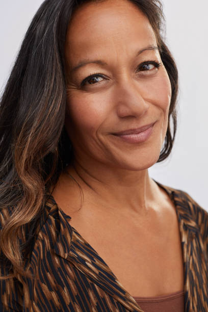 istock Mature woman with a perfect complexion smiling 1193257028