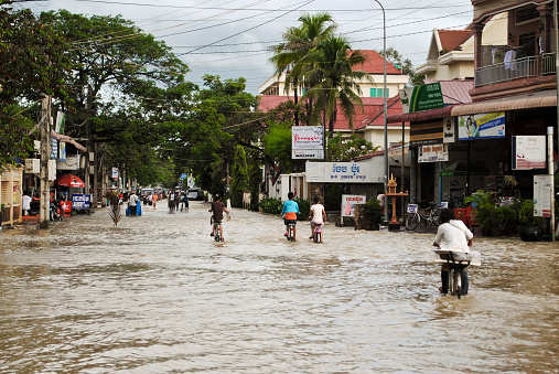 The daily life of the local people against flooding in the streets of Cambodia