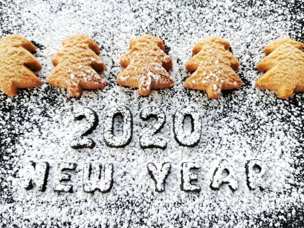 istock Various ginger cookies, spices cinnamon stick, powdered sugar. 1193261960