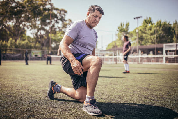 istock Mature man preparing for soccer match 1193265150