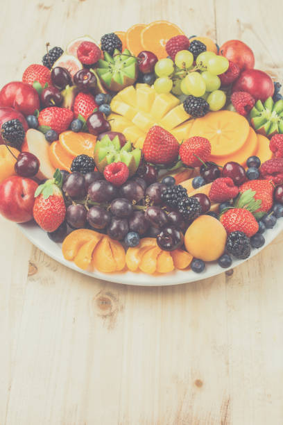 istock Raw fruits berries platter 1193266271