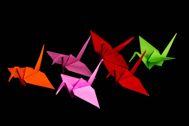 istock Origami Cranes Isolated on a Black Background 1193266751