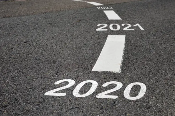 2020 to 2022 on black asphalt road and white marking lines