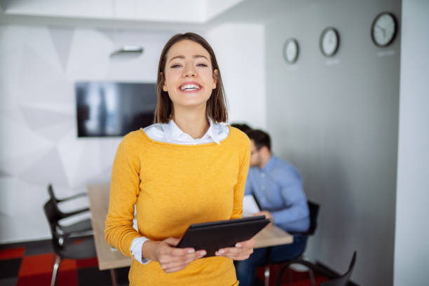 istock Young businesswoman using digital tablet in the office 1193270494