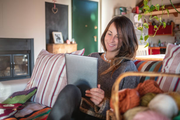 istock Young knitter woman relaxing and working at home 1193270687