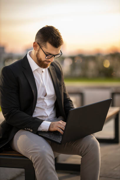 istock Businessman with laptop 1193271107