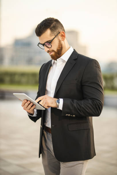 istock Businessman with digital tablet 1193271896