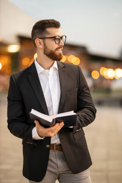 istock Businessman reading a book and resting 1193272097