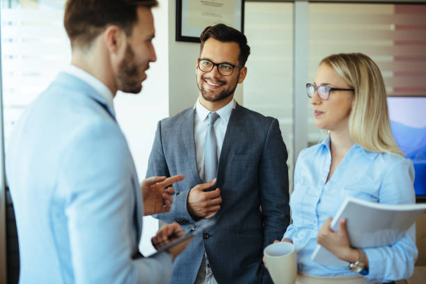 istock Businesswoman sharing some data with colleagues 1193272156
