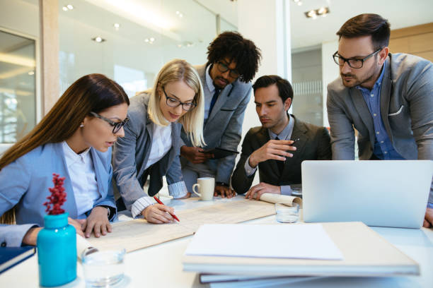 istock Successful business team working on a project in the office 1193272528