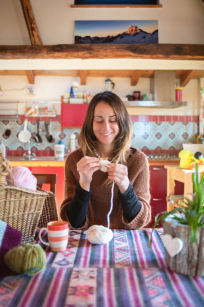 istock Young knitter woman relaxing and working at home 1193273209