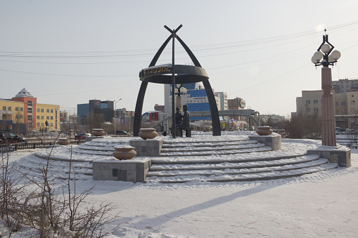 Yakutsk, Russia- March 14, 2019: Urban landscape. The monument to the Russian traveler Semyon Dezhnev