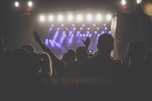 istock Large crowd having fun on a music festival 1193274694