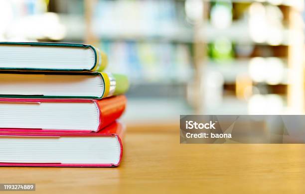 Stack Of Books On The Table Of Public Library Stock Photo - Download Image Now - Book, Library, Stack