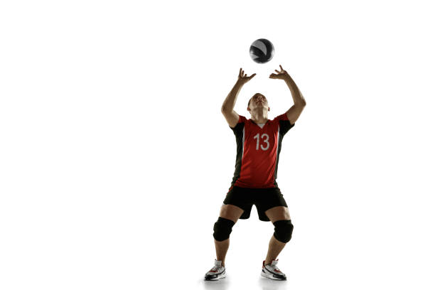 istock Young caucasian volleyball player placticing isolated on white background 1193275004