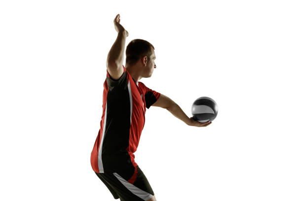 istock Young caucasian volleyball player placticing isolated on white background 1193275022