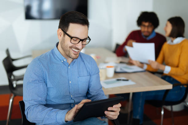 istock Businessman using digital tablet in the office 1193275027