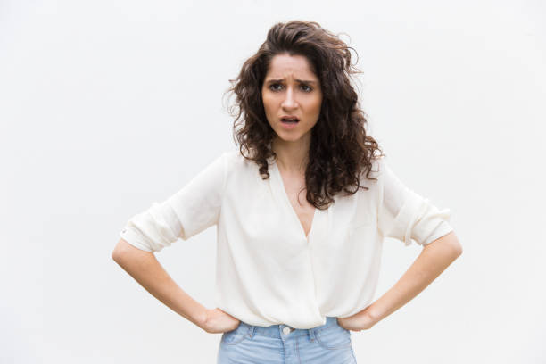 istock Upset annoyed woman keeping hands on hips 1193275971