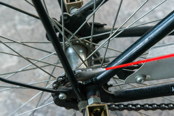 istock Bicycle chain lubrication with oil spray 1193275993