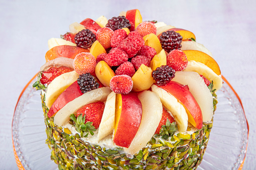 Mixed fruit cake. Birthday cake / birthday cake with fresh fruits.