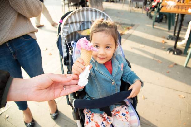 istock Ice-cream time for a little girl 1193278222
