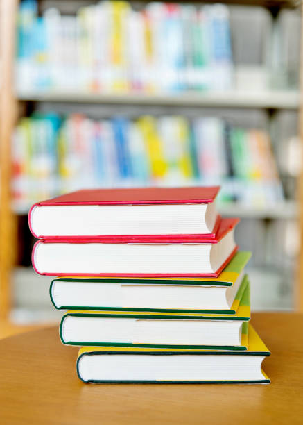 istock Stack of  books on the table of public library 1193278364