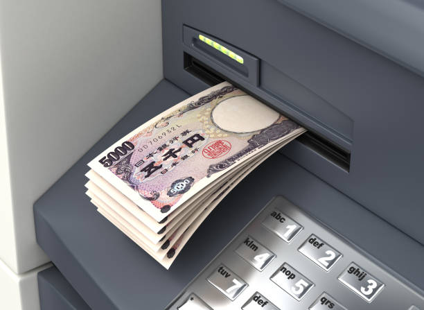 istock Withdrawal Japanese Yen From ATM 1193278516