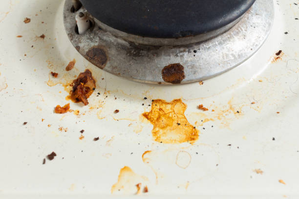 istock gas stove surface with traces of burned fat. close-up 1193280593