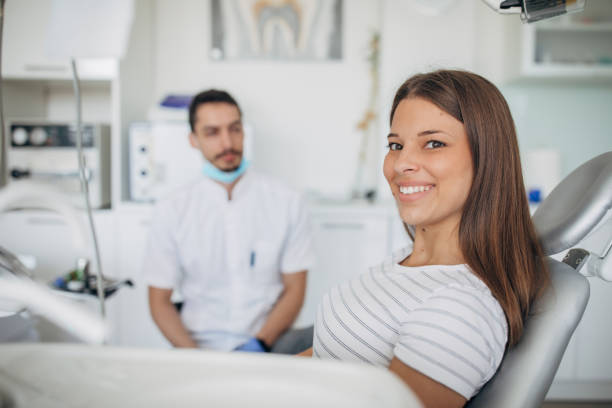 istock Man dentist and beautiful lady 1193280893